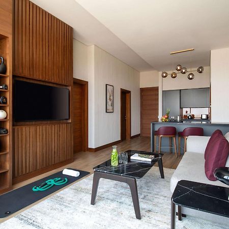 Swissotel Living Yidda Exterior foto The interior of a typical apartment at The Standard East Village