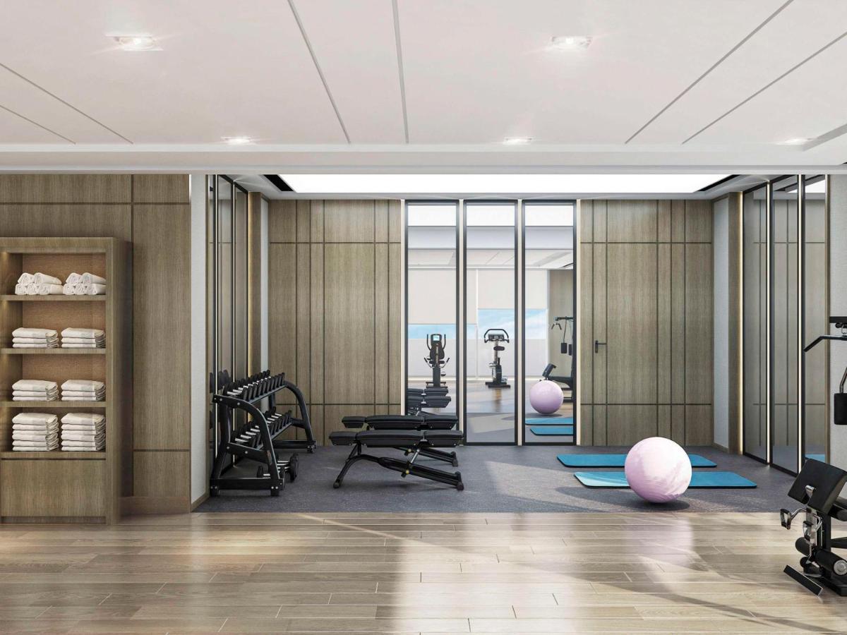Swissotel Living Yidda Exterior foto The gym at The Hari