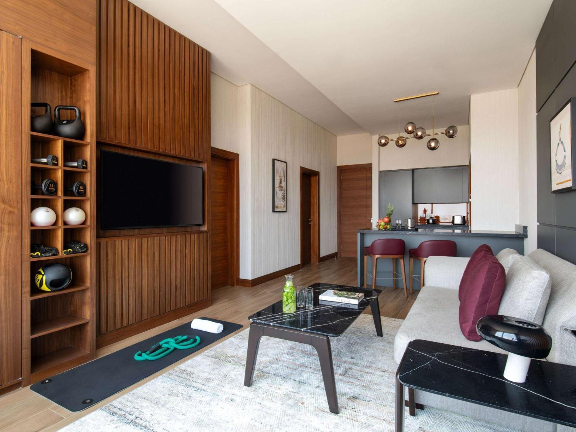 Swissotel Living Yidda Exterior foto The interior of a typical apartment at The Standard East Village