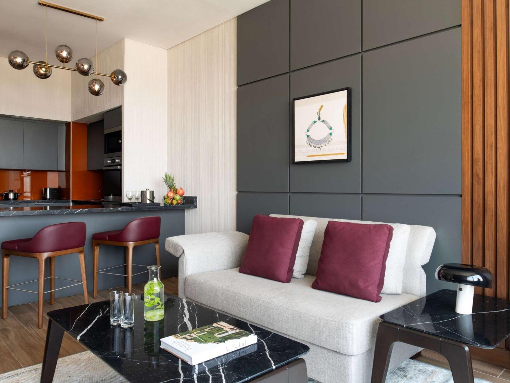 Swissotel Living Yidda Exterior foto A living room in a serviced apartment in London